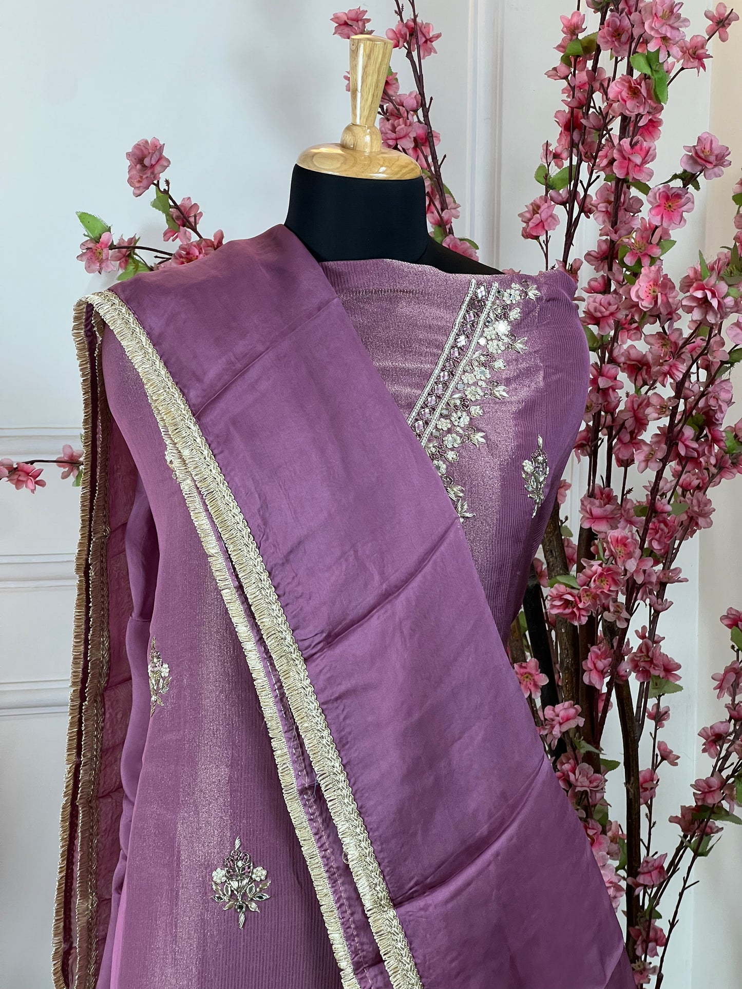 Top: Pure ivory silk with pearl thread, mirrors and nalki handwork; Bottom: Pure crape; Dupatta: Soft pure organja with lace work;
