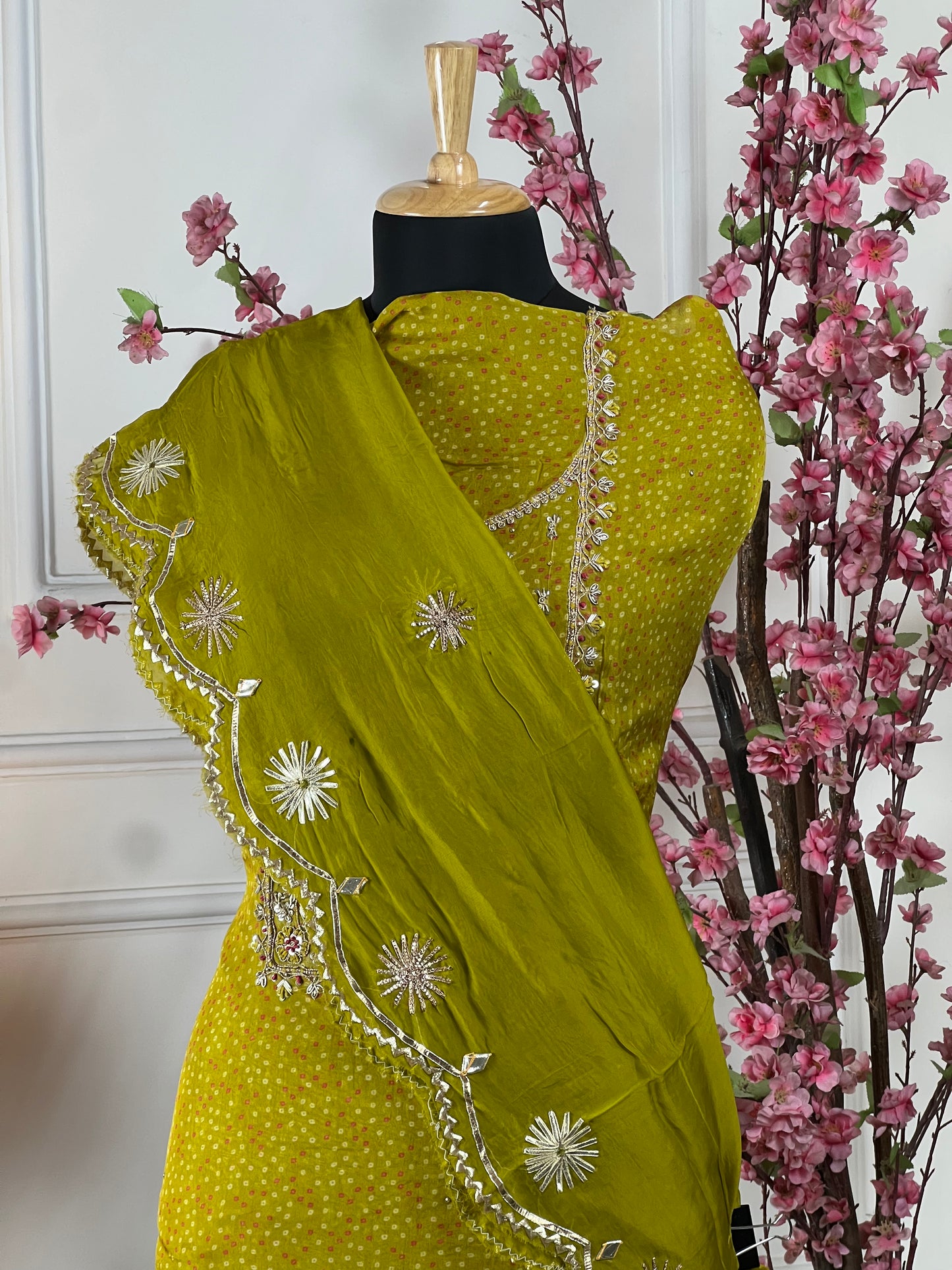 Top: Pure organja with knot, sequin and thread dori work on neck; Bottom: Pure soft opada; Dupatta: Pure organja gota patti cut work;
