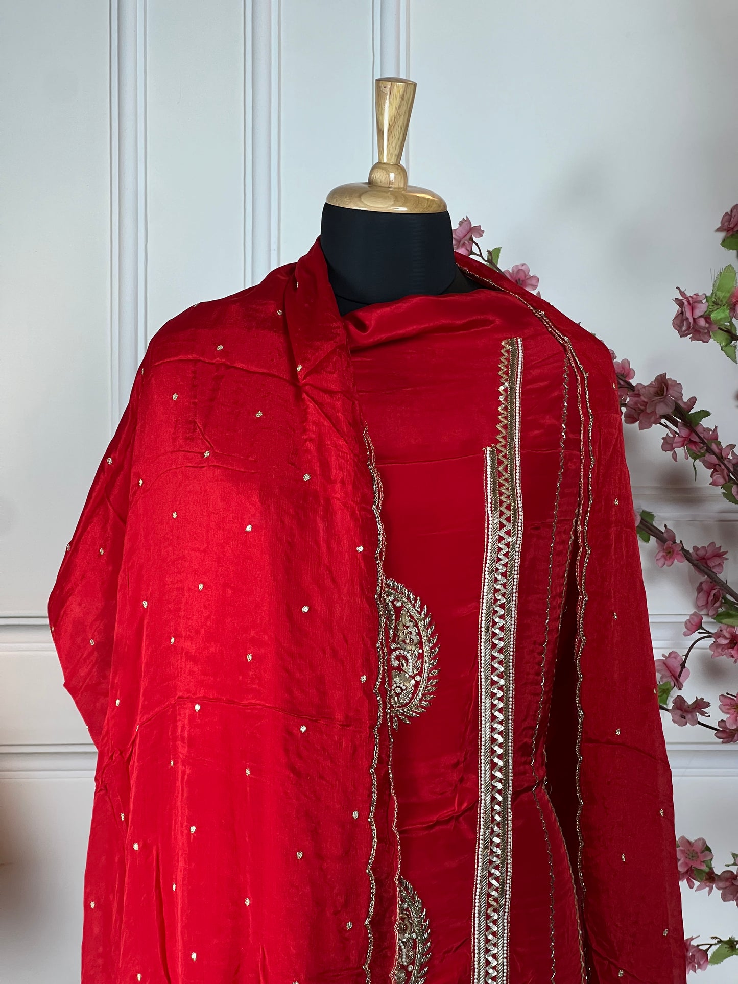 Top: Pure crape with nalki, dabka, sequins and pearl handwork; Bottom: Pure soft opada silk; Dupatta: Pure chinon heavy handwork lace;