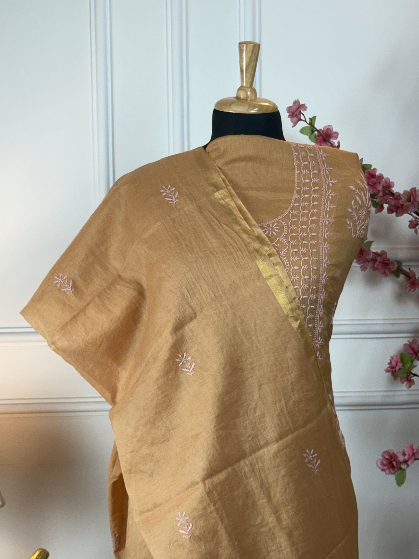 Top: Pure mul fabric with thread handwork; Bottom: Pure crape 2.25 m approx; Dupatta: Pure mul fabric with thread handwork and golden border;