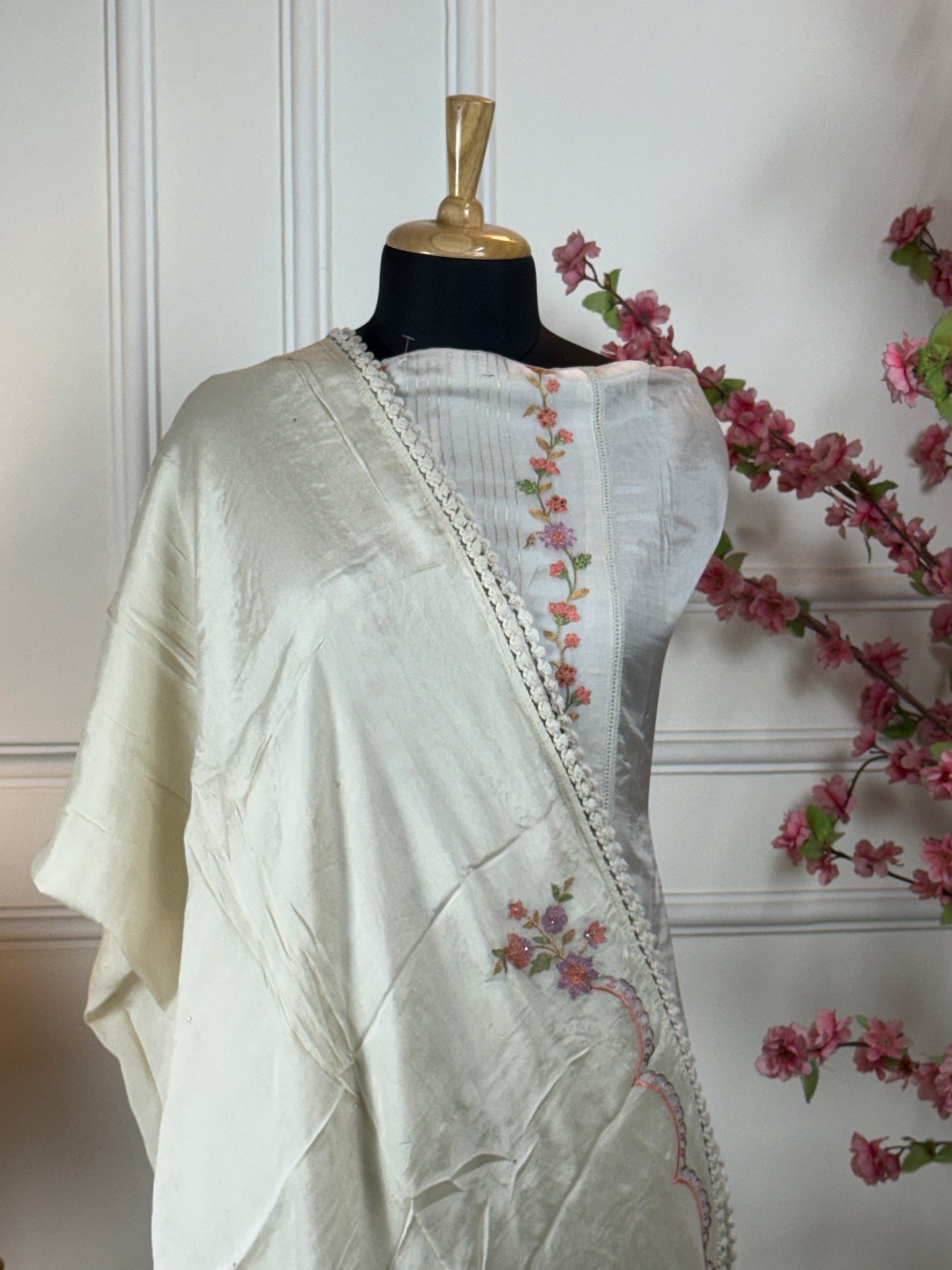 Top: Pure Habutai silk with elegant thread work on neck, ghera and sides; Bottom: Pure jam satin; Dupatta: Pure chinon with work and thread lace;