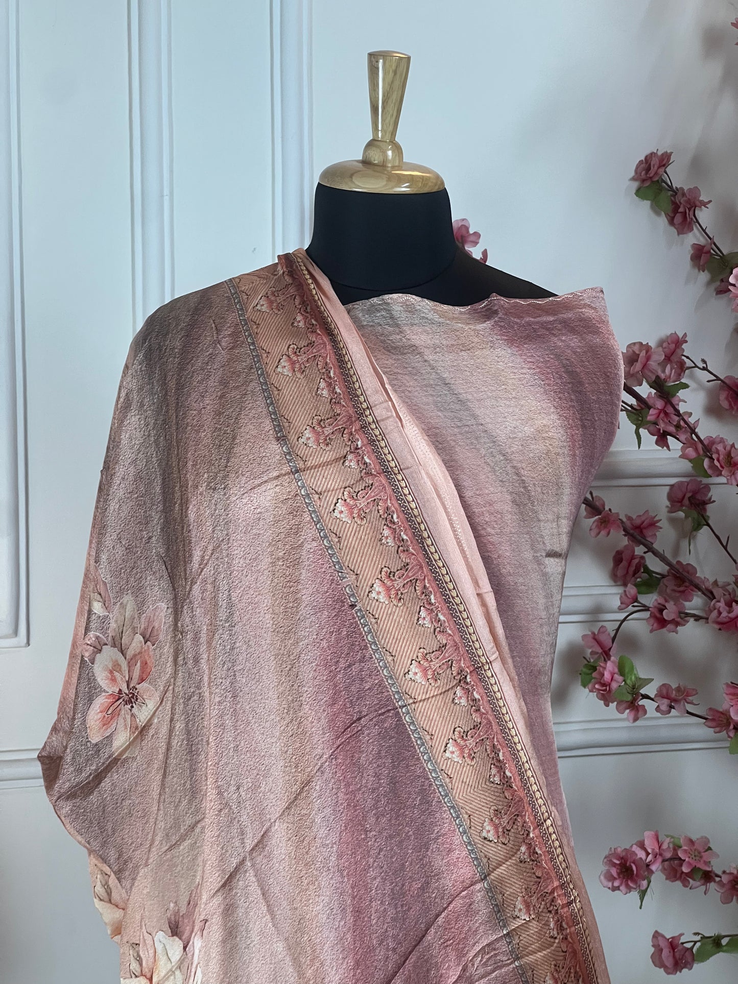 Top: Pure crape with designer print and elegant thread work on front and same work on sleeves; Bottom: Pure crape; Dupatta: Pure soft light weight chinon border with print on border and print inside;