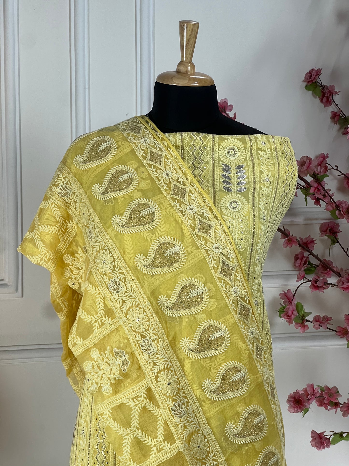 Top: Pure jorgette thread work Laknavi highlighted with gota patti, sequins and soft jari work on sleeves; Bottom: Pure premium silk santoon; Dupatta: Pure chiffon with same heavy Laknavi work;