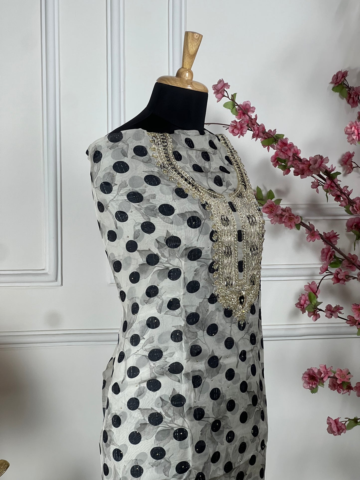Top: Pure premium organja with premium jari, dabka, pearl, nalki and sequins work on neck with lattan border; Bottom: Pure premium opada silk; Dupatta: Pure premium organja silk with cutwork and nalki border and buti;