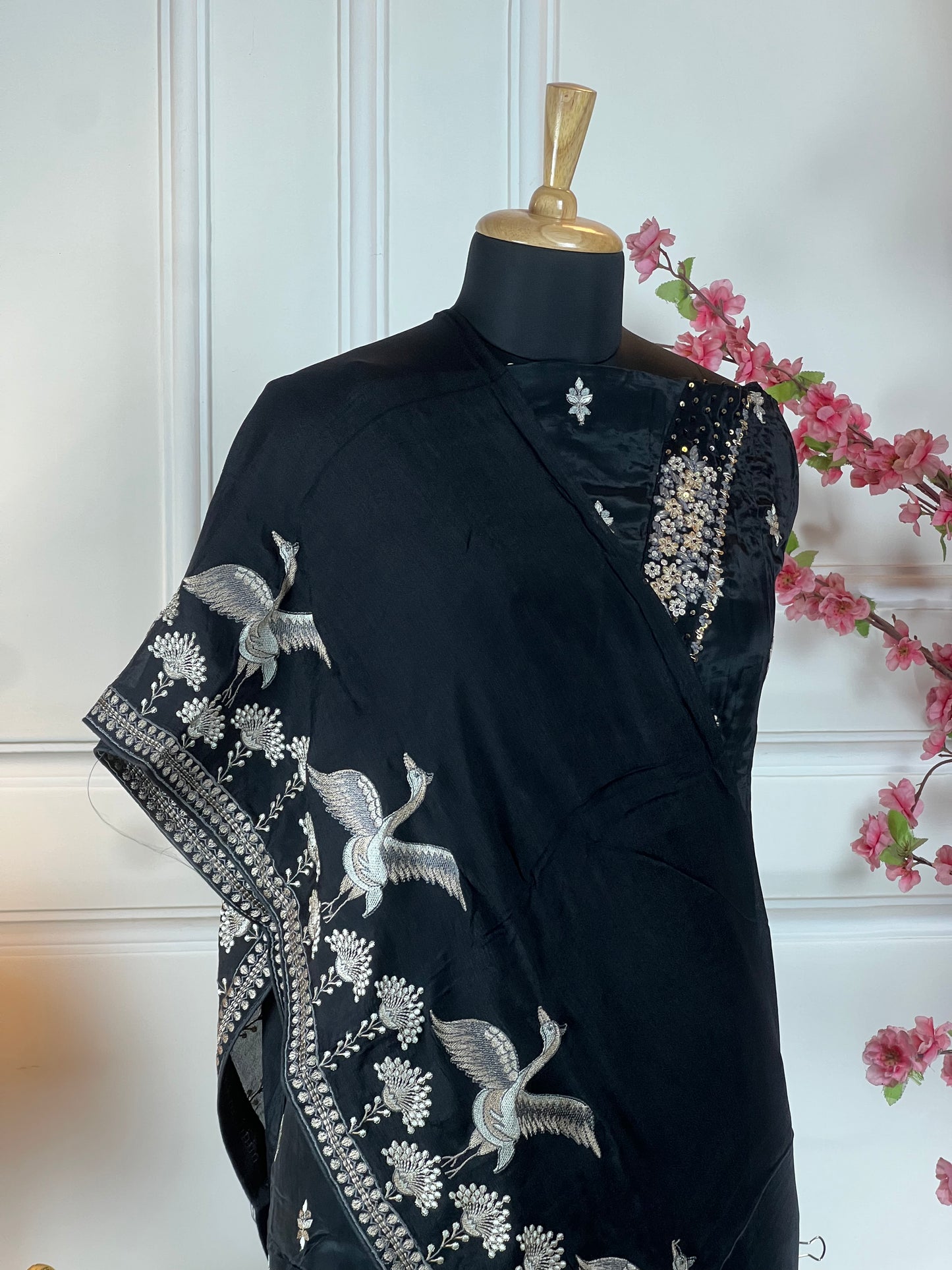 Top: Pure crape with V-shape neck thread, pearls, sequins, dabka work and buti on front; Bottom: Pure soft opada; Dupatta: Pure chinon four side thread work and one side heavy work on dupatta;