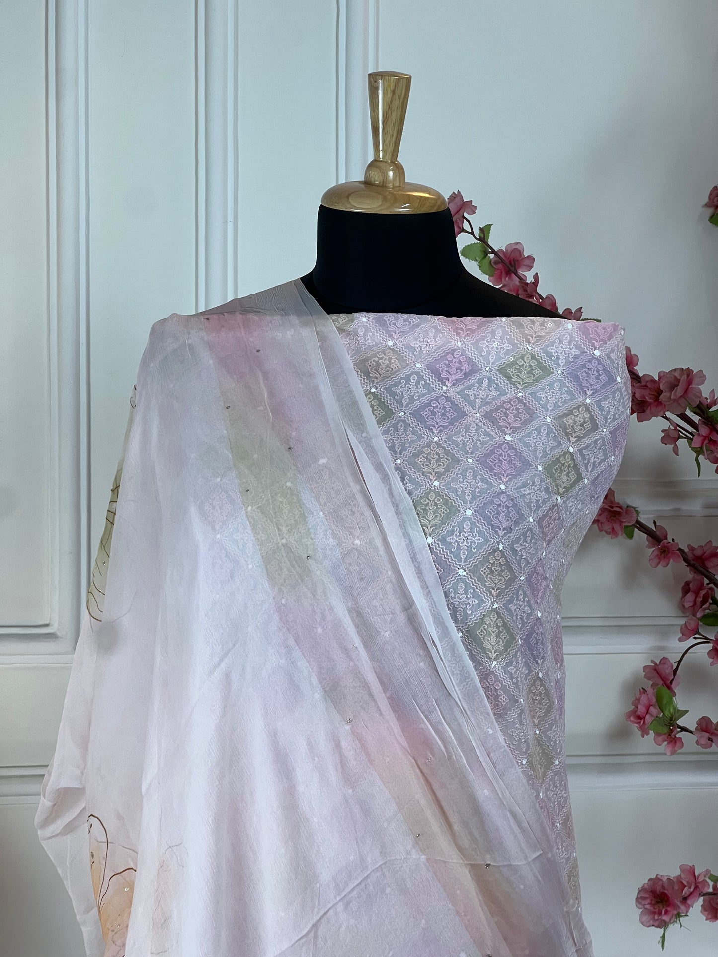 Top: Pure organja with thread work and hand touching; Bottom: Pure muslin; Dupatta: Pure chiffon hand painting;