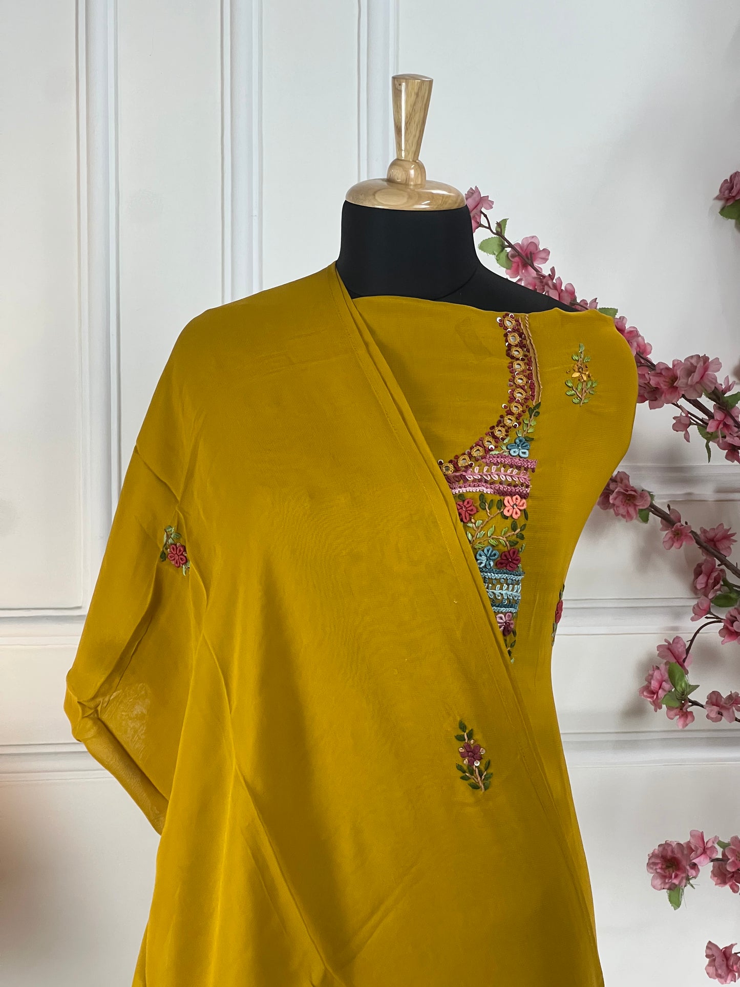 Top: Pure jorgette thread and sequins hand work on neck and front; Bottom: Pure heavy santoon silk; Dupatta: Pure jorgette thread work and tassels;