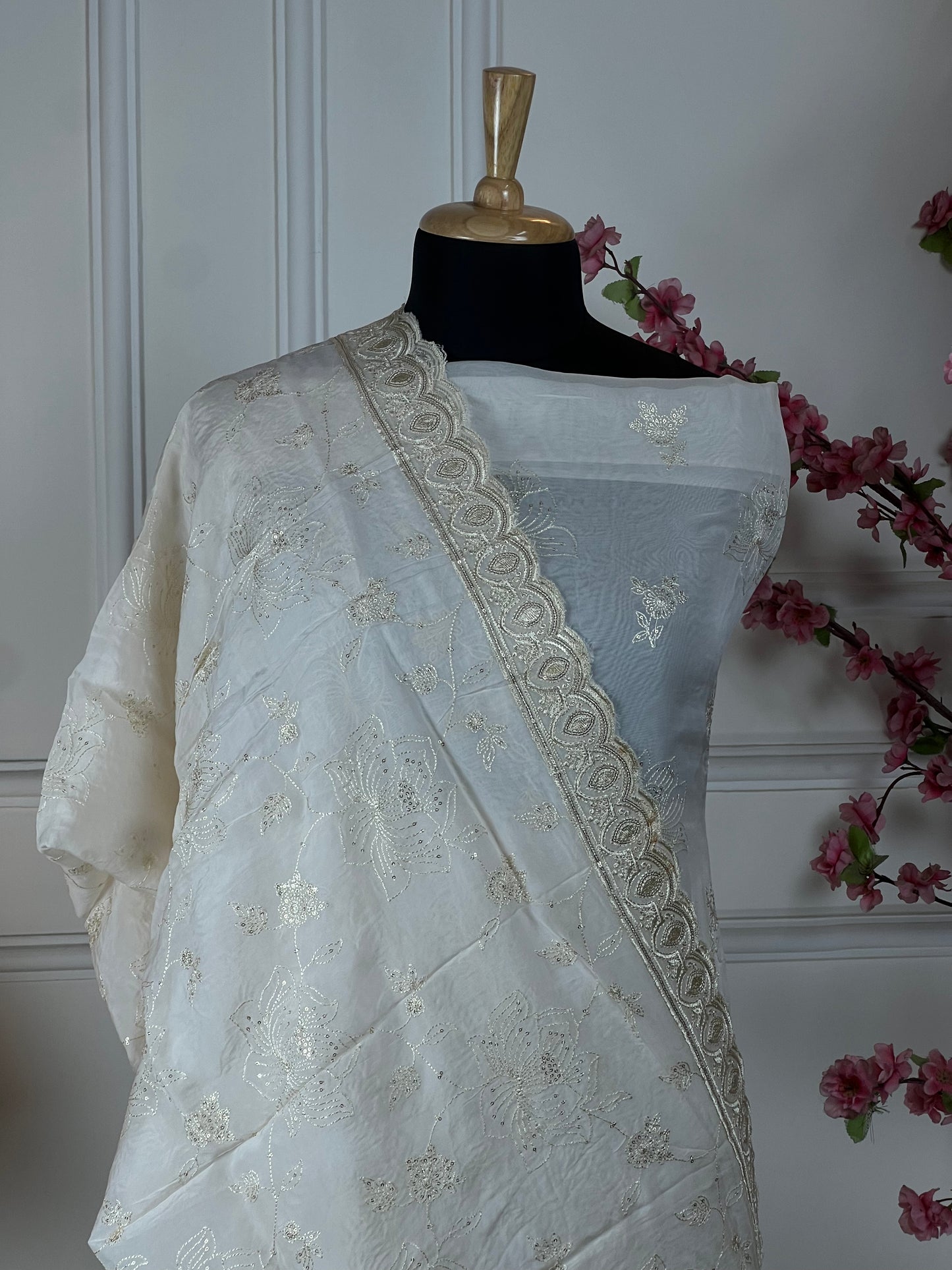 Top: Pure organja silk with thread work and sequins for highlight; Bottom: Pure soft opada; Dupatta: Pure organja silk four side work border and jaal work;