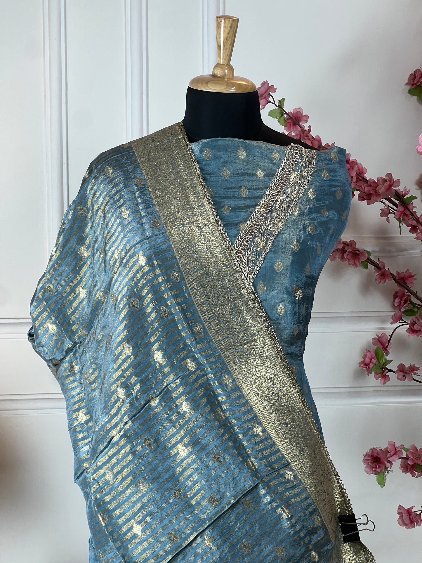 Top: Pure soft shimmer silk brocket buti and V-neck dori, sequins, knot work and dabka handwork; Bottom: Super soft opada silk; Dupatta: Brocket buti and border shimmer silk soft;
