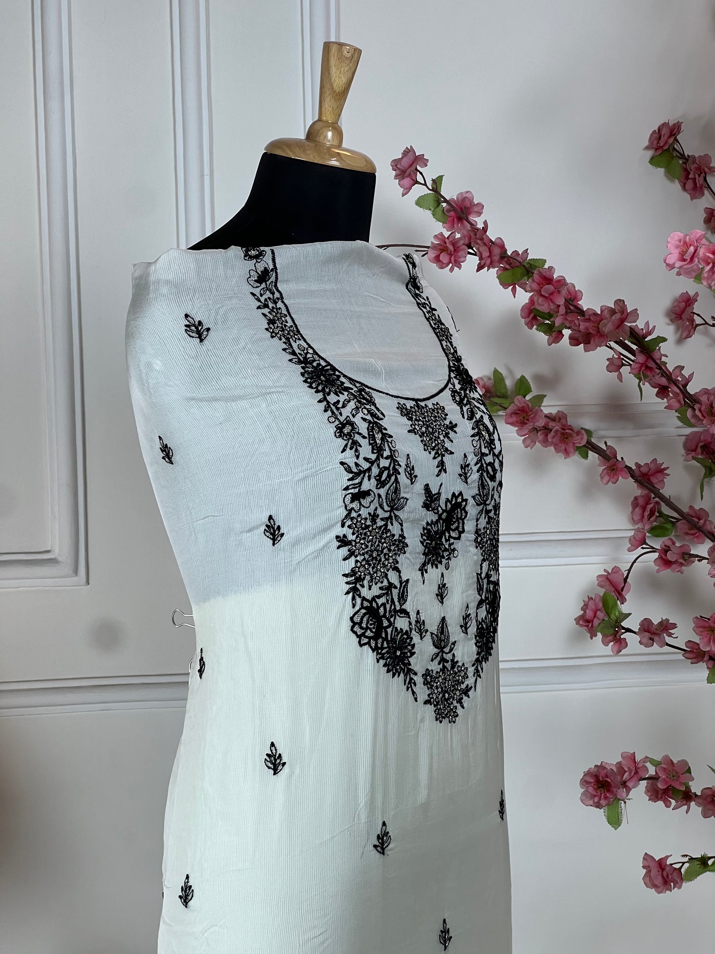 Top: Muslin Kota cheque thread work on neck and buti on front; Bottom: Pure muslin; Dupatta: Muslin Kota cheque with thread work;