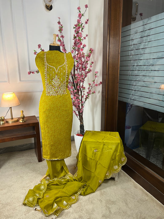 Top Pure organja with knot sequin and thread dori work on neck Bottom Pure soft opada Dupatta Pure organja gota patti cut work