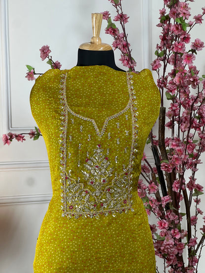 Top Pure organja with knot sequin and thread dori work on neck Bottom Pure soft opada Dupatta Pure organja gota patti cut work