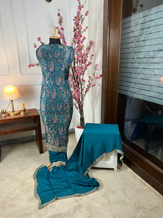 Top Pure brocket handwork with nalki sequin and pearl work on border back plain shimmer Bottom Pure soft opada Dupatta Pure chinon four side border with handwork and pipen1