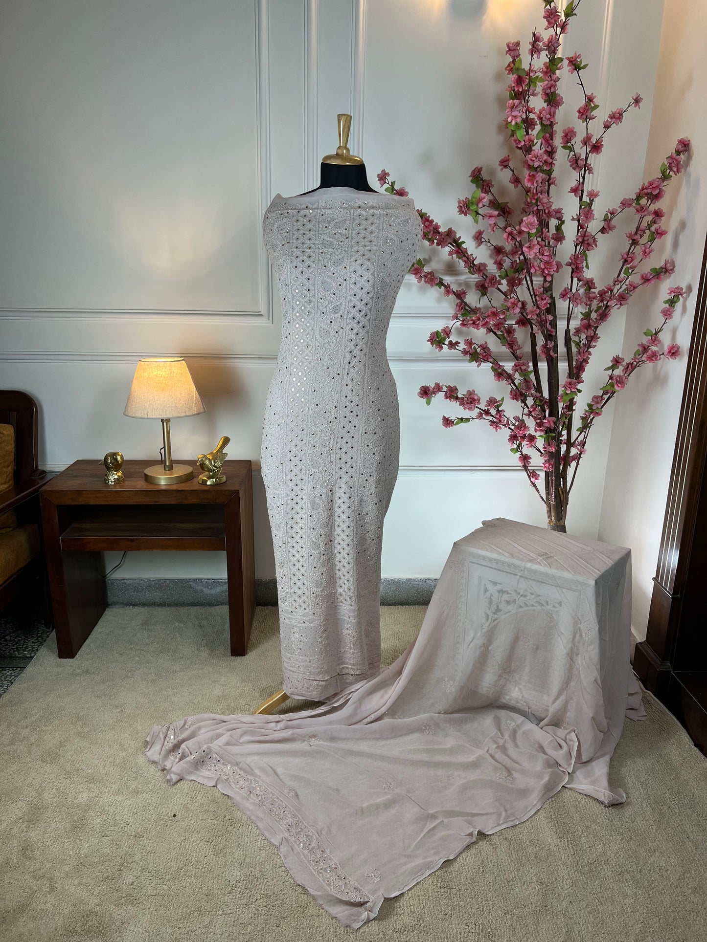 Top Pure jorgette handwork and mukaish work on front and handwork on back buti and baju border Bottom Plain crape pant piece Dupatta Pure jorgette handwork and mukaish work