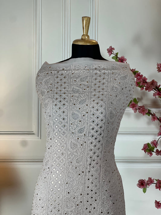 Top Pure jorgette handwork and mukaish work on front and handwork on back buti and baju border Bottom Plain crape pant piece Dupatta Pure jorgette handwork and mukaish work