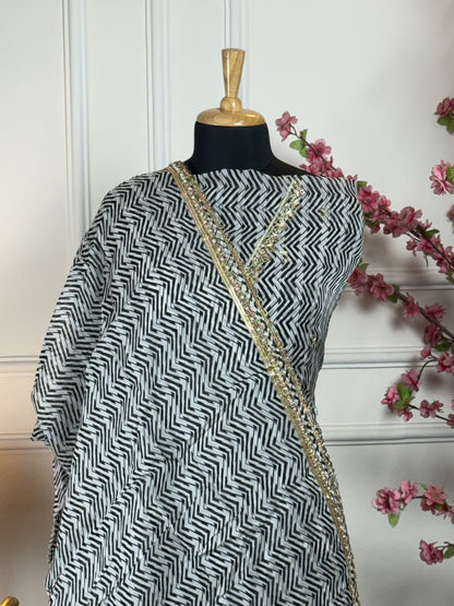 Top Pure and soft organja printed with dabka pearl nalki Vshape neck work Bottom Pure crape with payal work and buti Dupatta Pure organja printed with heavy lace