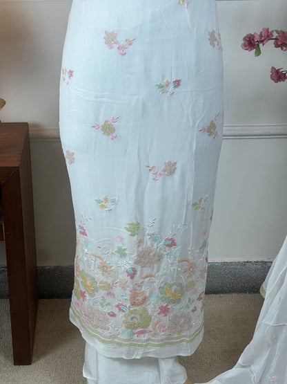 Top Pure jorgette with multicolour sequins and thread work on border Bottom Pure heavy silk santoon Dupatta Pure jorgette with heavy sequins border and buti