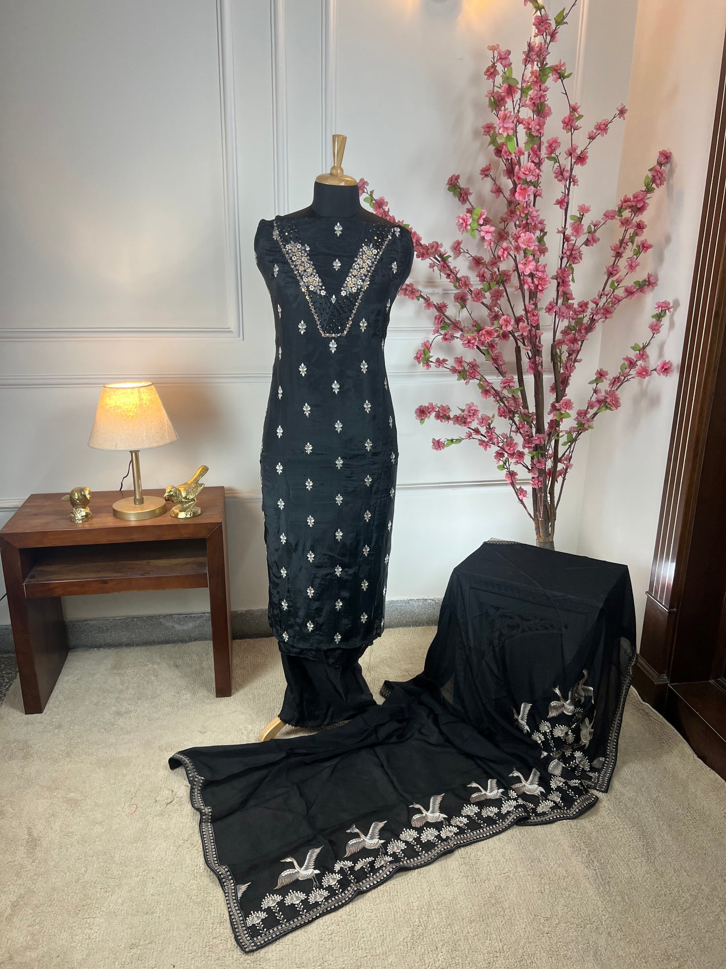 Top Pure crape with Vshape neck thread pearls sequins dabka work and buti on front Bottom Pure soft opada Dupatta Pure chinon four side thread work and one side heavy work on dupatta