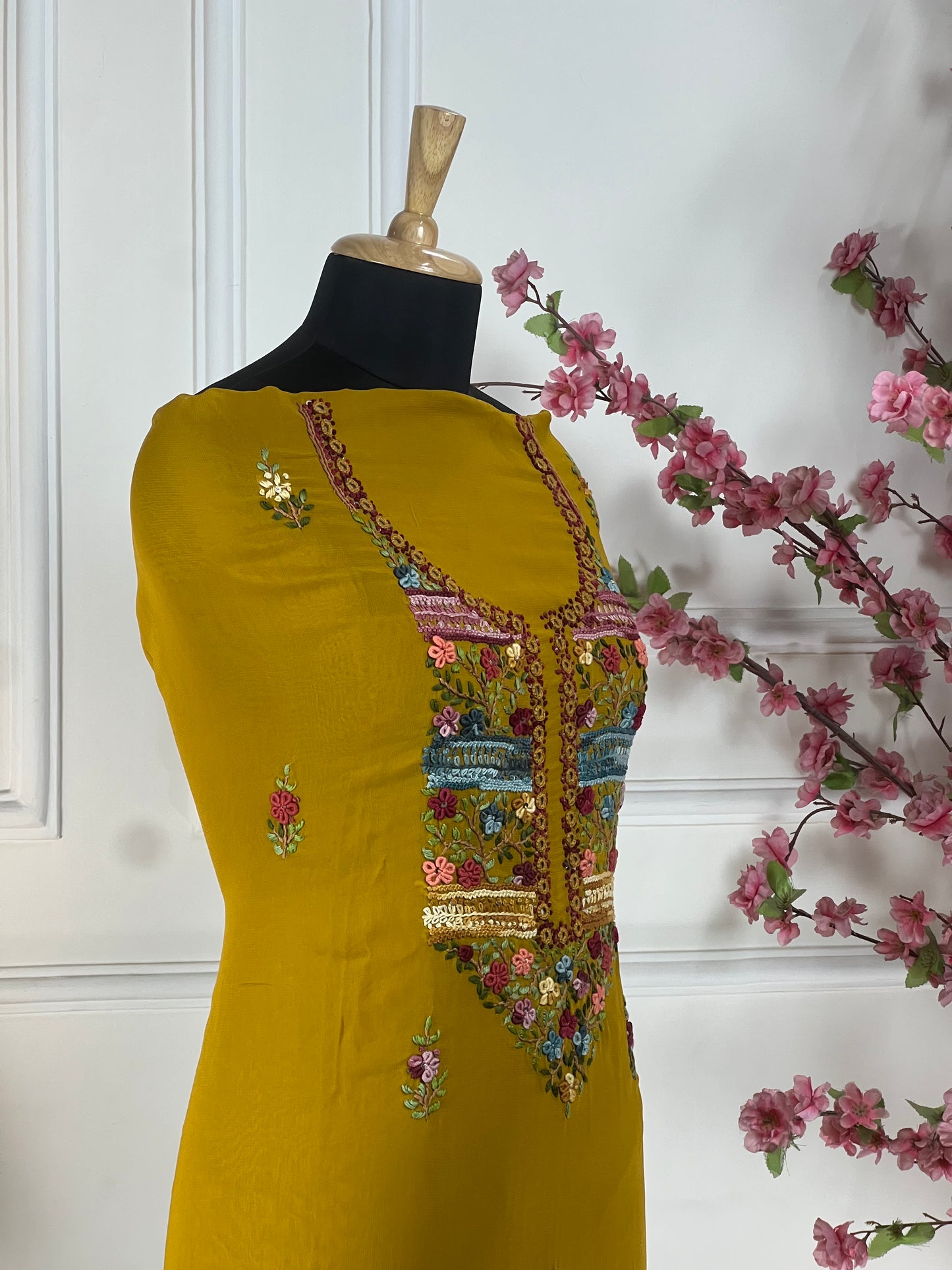 Top Pure jorgette thread and sequins hand work on neck and front Bottom Pure heavy santoon silk Dupatta Pure jorgette thread work and tassels