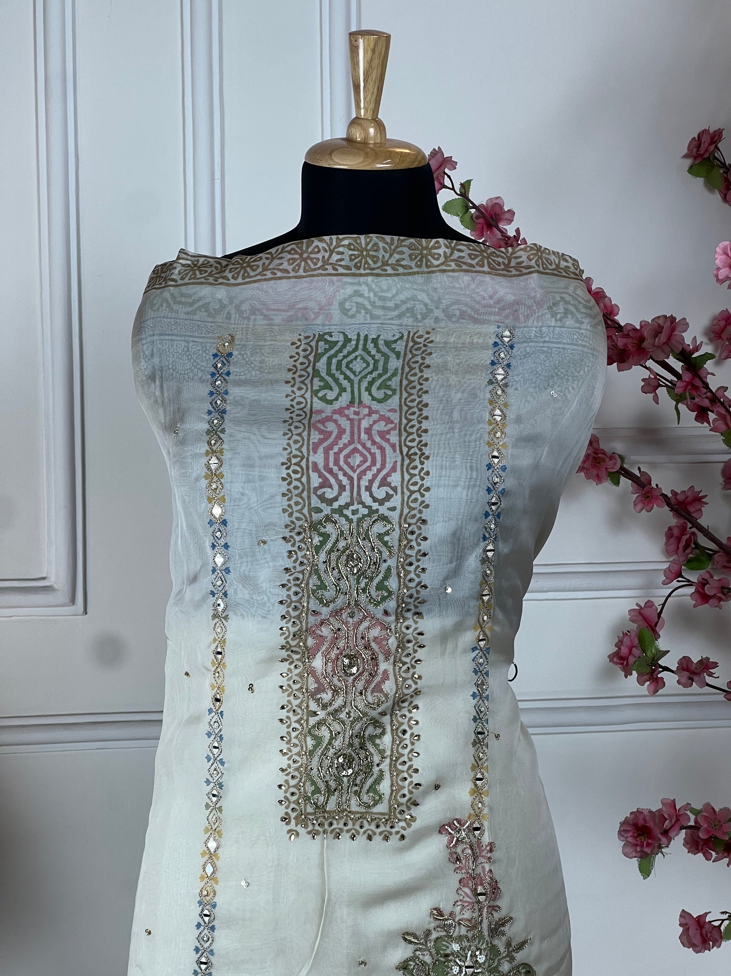 Top Pure organja silk designer print and highlight on print with chain stitch highlights Bottom Pure muslin Dupatta Pure organja same print and work on dupatta