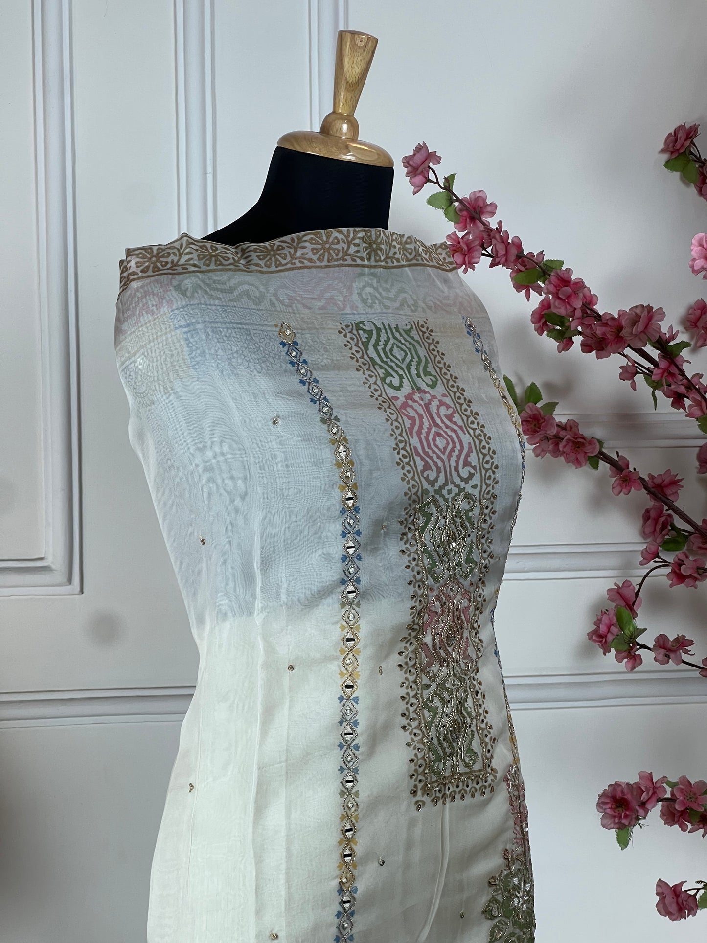 Top Pure organja silk designer print and highlight on print with chain stitch highlights Bottom Pure muslin Dupatta Pure organja same print and work on dupatta