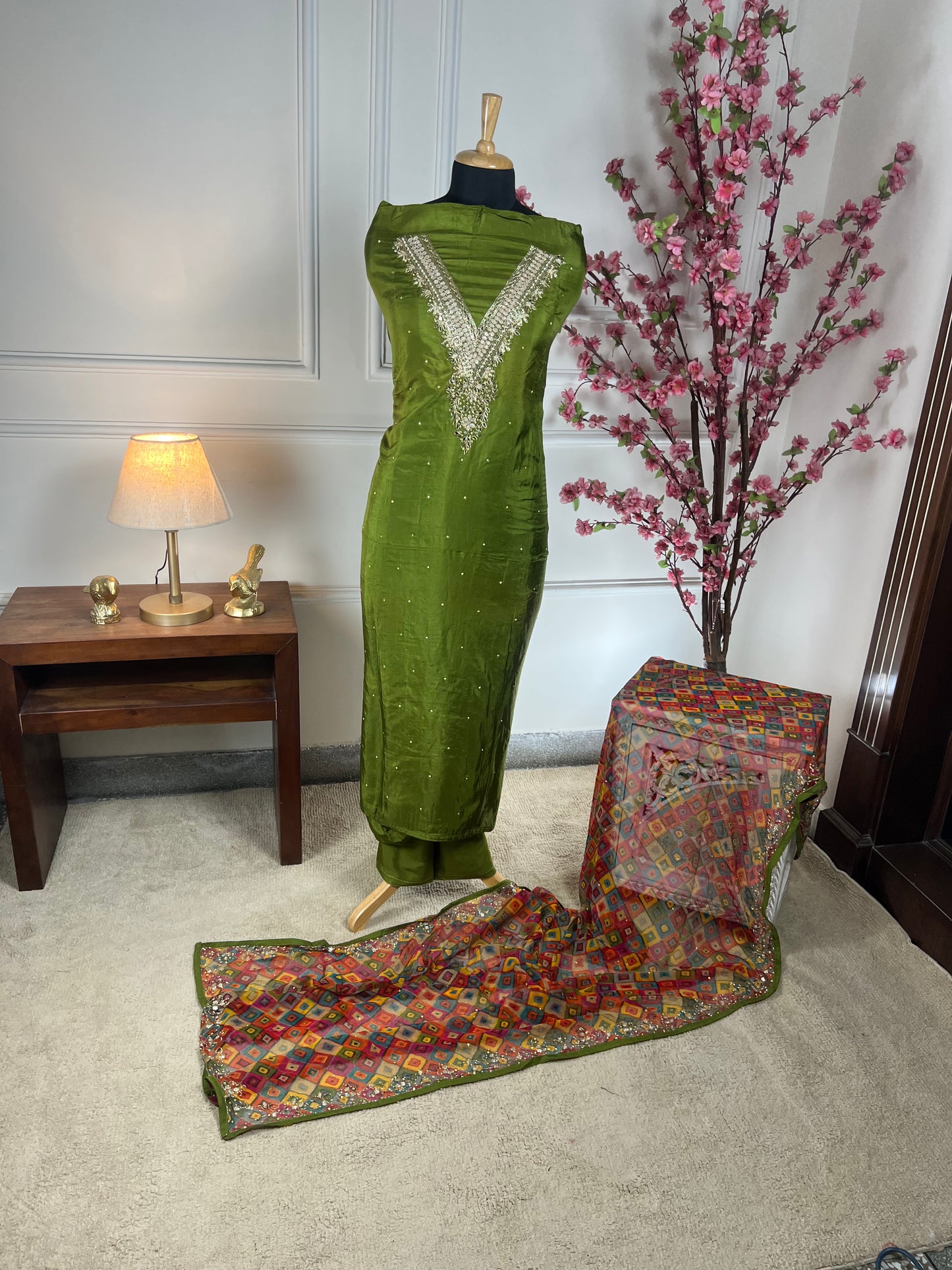 Top - Pure opada silk with hand embroidery - pearls, sequins, dabka work on neck<br>Bottom - Pure silk santoon<br>Dupatta - Pure chiffon printed with handwork, four side border Art No 73
