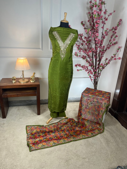 Top - Pure opada silk with hand embroidery - pearls, sequins, dabka work on neck<br>Bottom - Pure silk santoon<br>Dupatta - Pure chiffon printed with handwork, four side border Art No 73