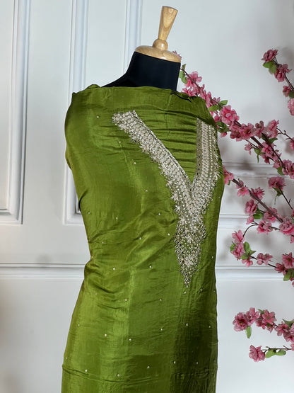 Top - Pure opada silk with hand embroidery - pearls, sequins, dabka work on neck<br>Bottom - Pure silk santoon<br>Dupatta - Pure chiffon printed with handwork, four side border Art No 73