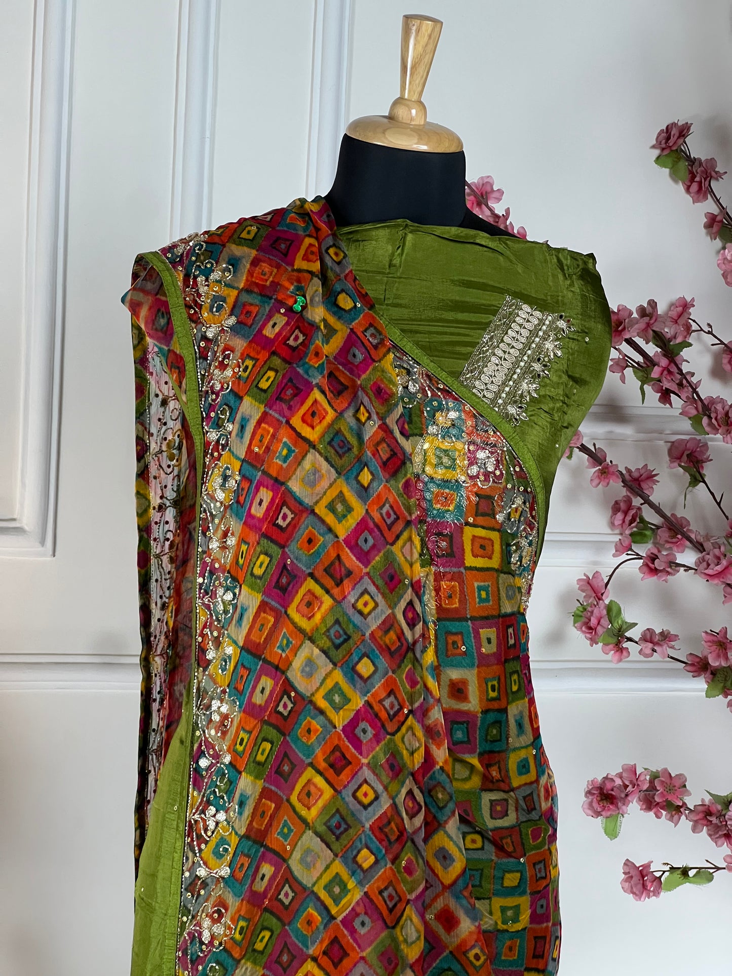 Top - Pure opada silk with hand embroidery - pearls, sequins, dabka work on neck<br>Bottom - Pure silk santoon<br>Dupatta - Pure chiffon printed with handwork, four side border Art No 73